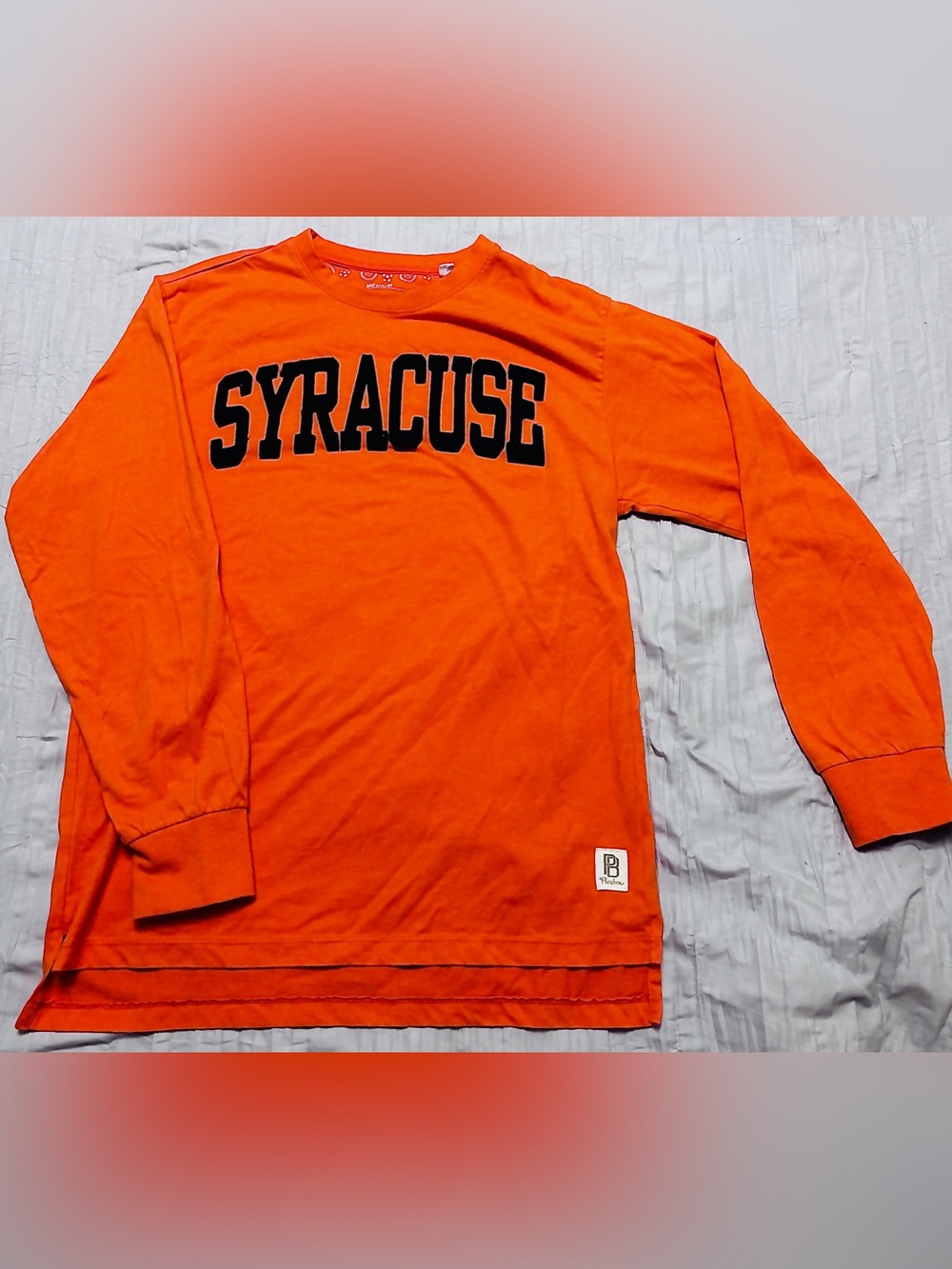 Pressbox Syracuse Long Sleeve Tee in Bright Orange with Black Lettering